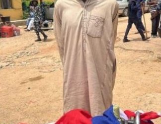 Police arrest Kano tailor producing Russian flags for protesters in Kano State.