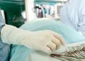 Police declare buttock enlargement doctor wanted as 36-year-old client dies during surgery.