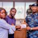 Inspector-General of Police Presents Insurance Cheques to Families of Fallen Officers.